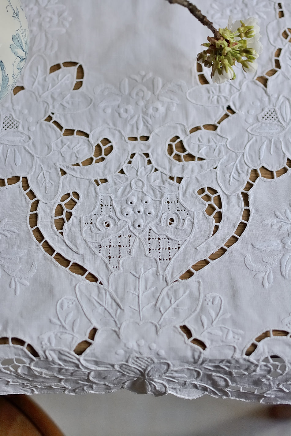 Small, richly embroidered tablecloth