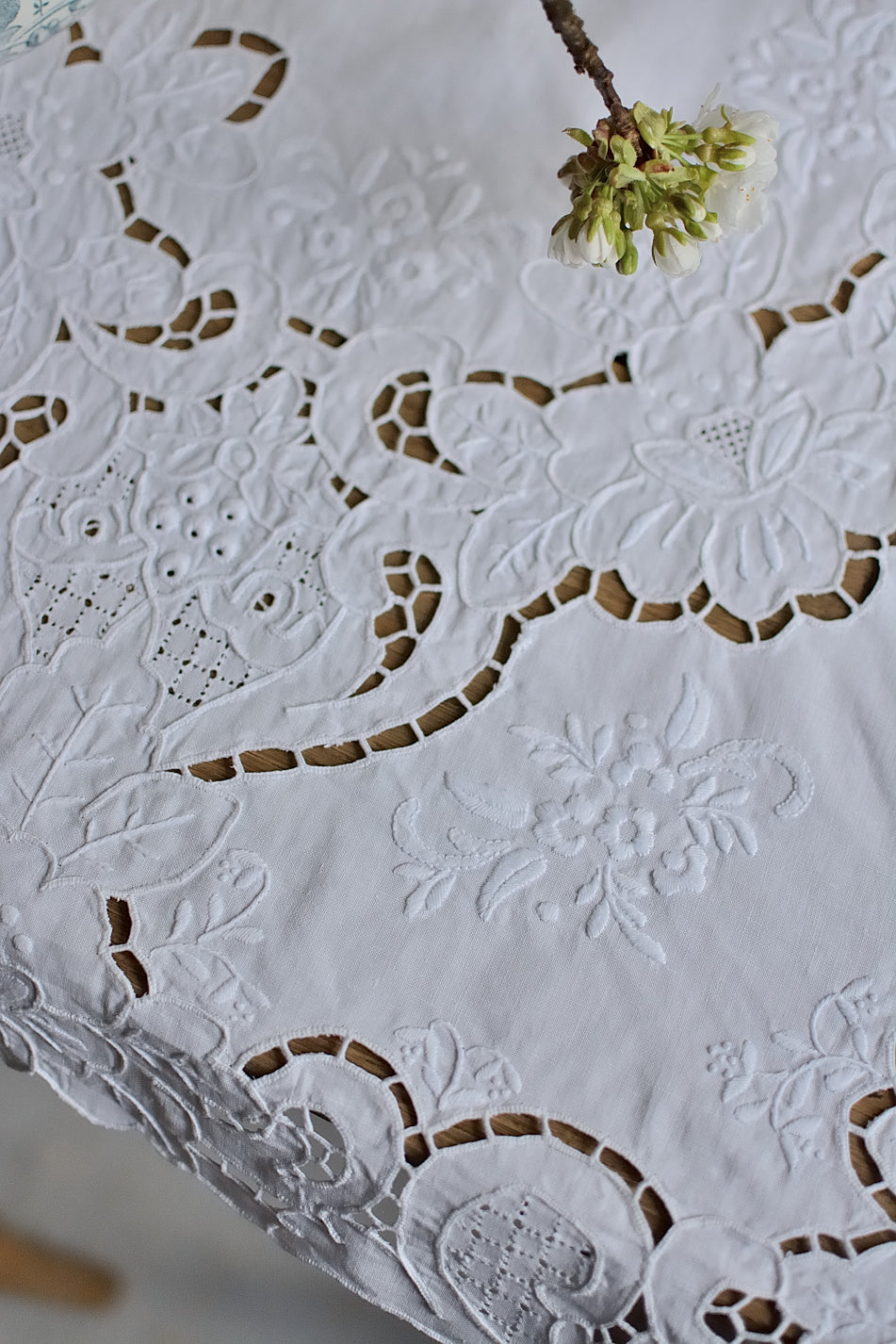 Small, richly embroidered tablecloth