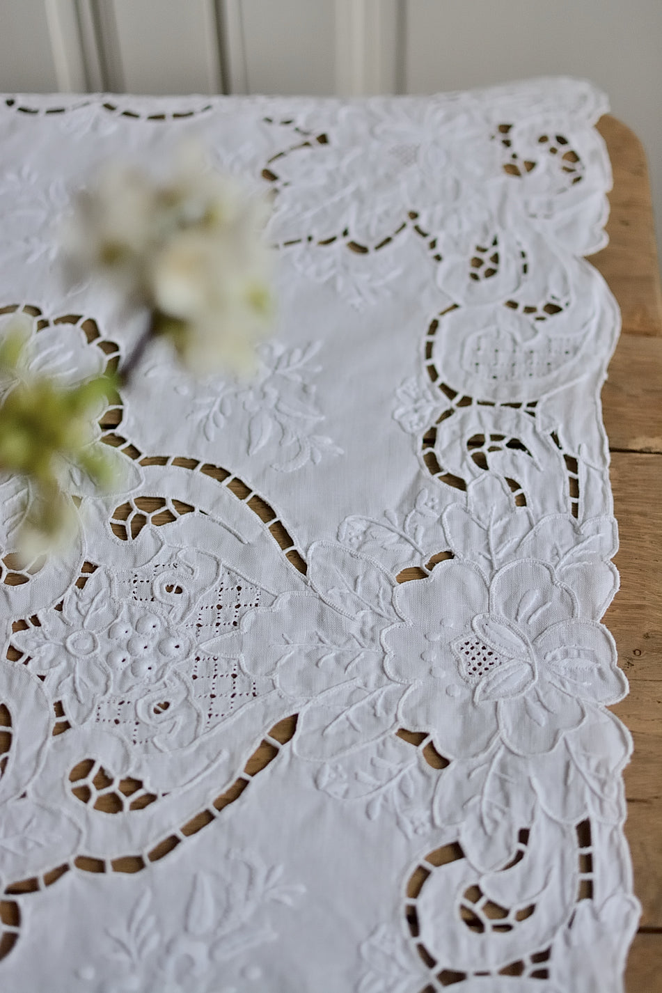 Small, richly embroidered tablecloth