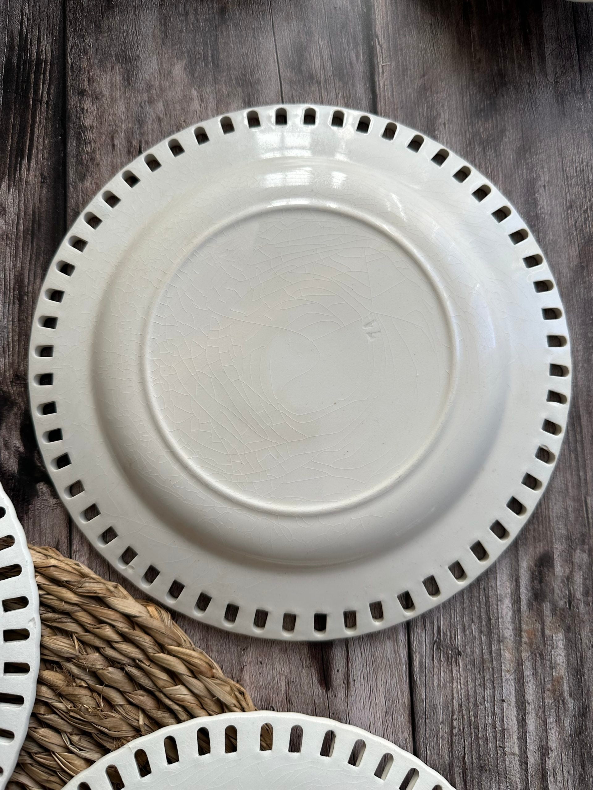 Set of four openwork plates + openwork Luneville plate