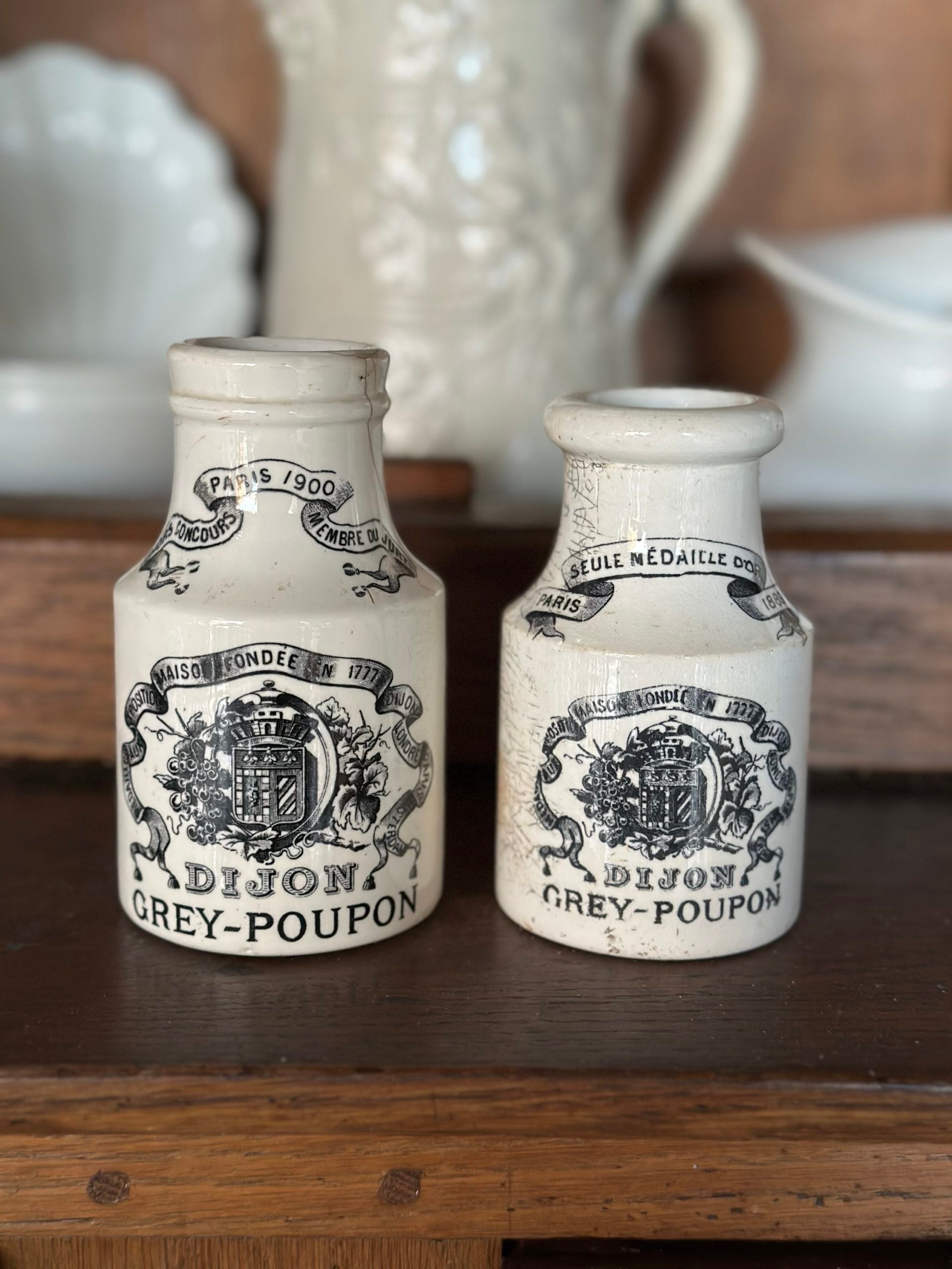 Two jars of Grey-Poupon Dijon