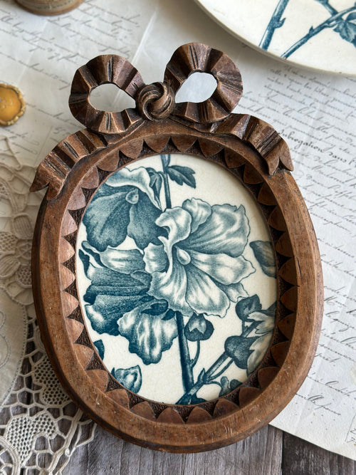 Carved wooden frame and ironstone Hollyhocks