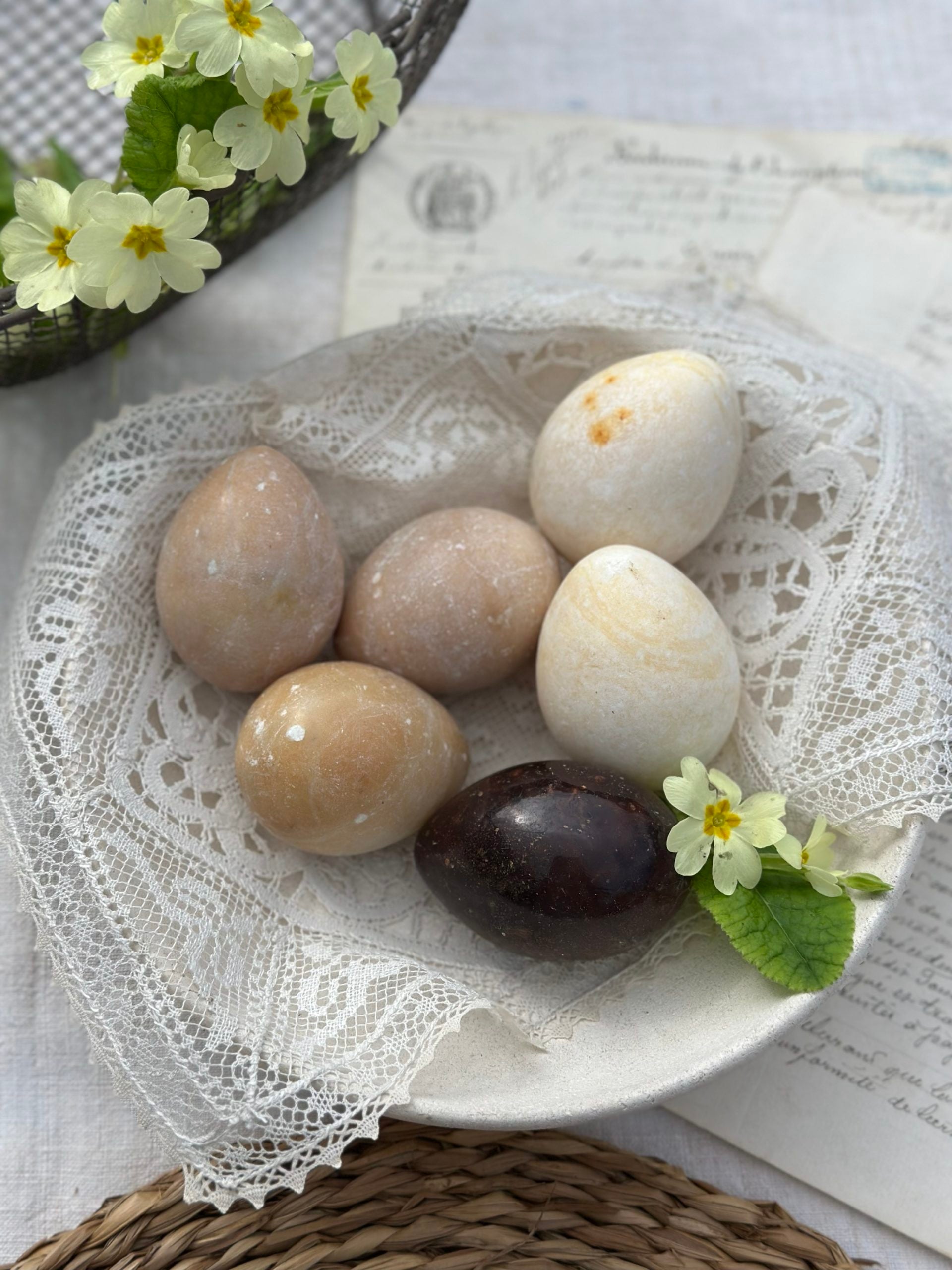 Decorative stone eggs with their cup