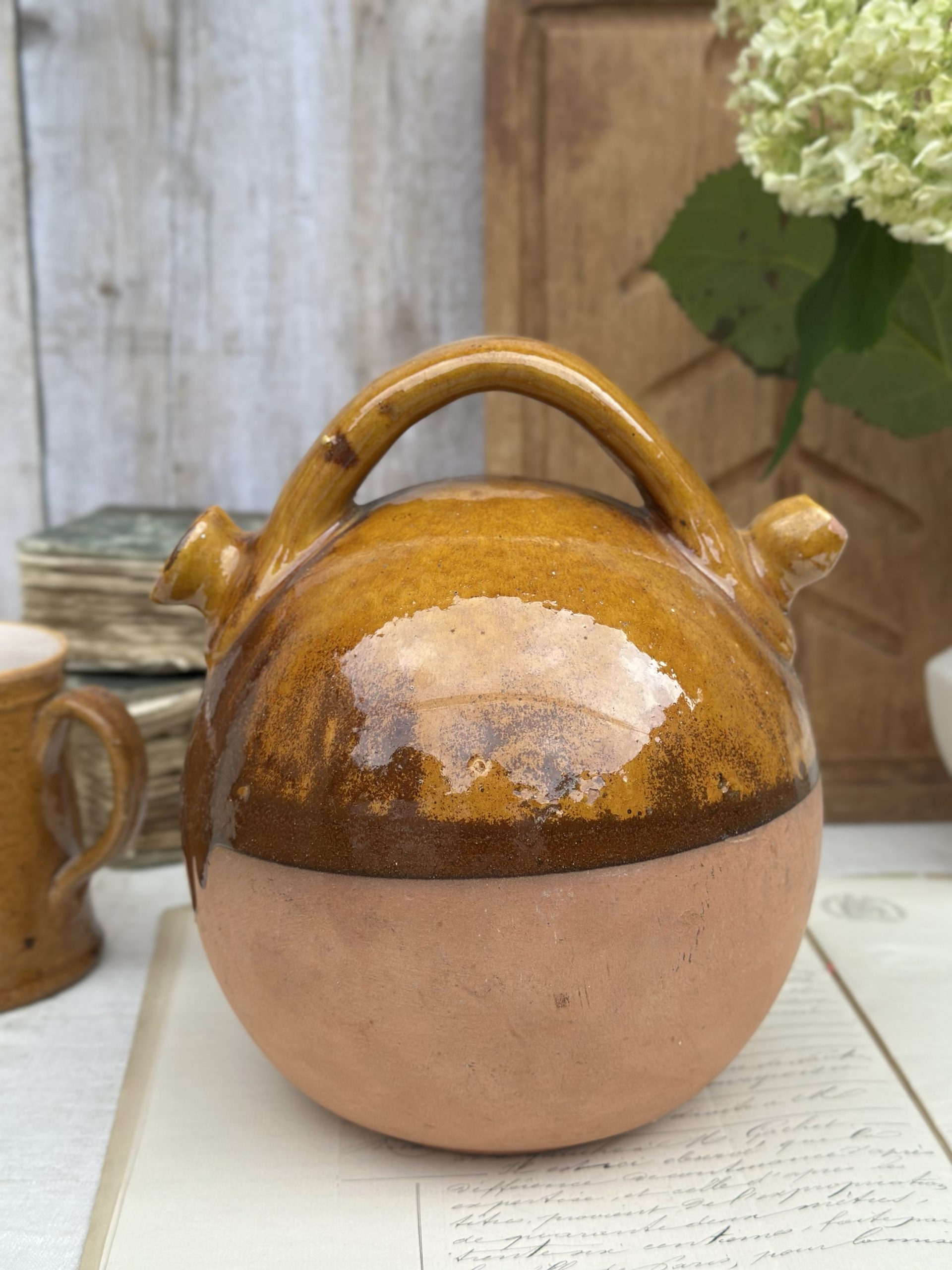 Gargoulette, a yellow glazed terracotta jug