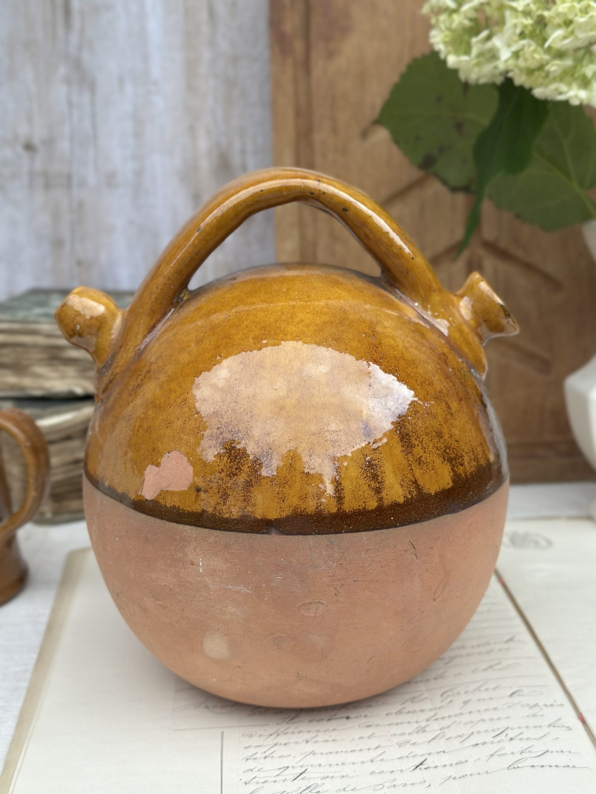 Gargoulette, a yellow glazed terracotta jug