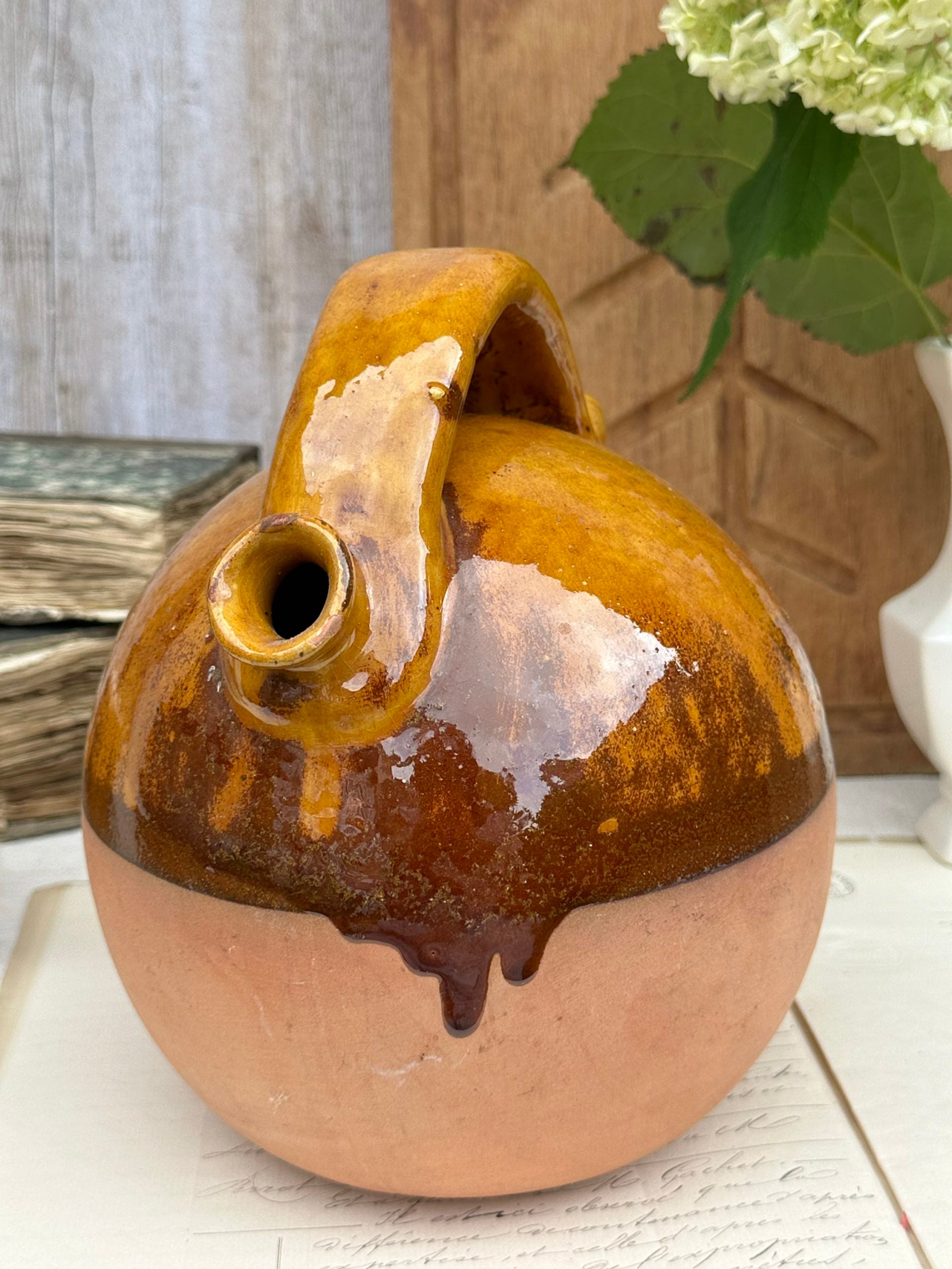 Gargoulette, a yellow glazed terracotta jug