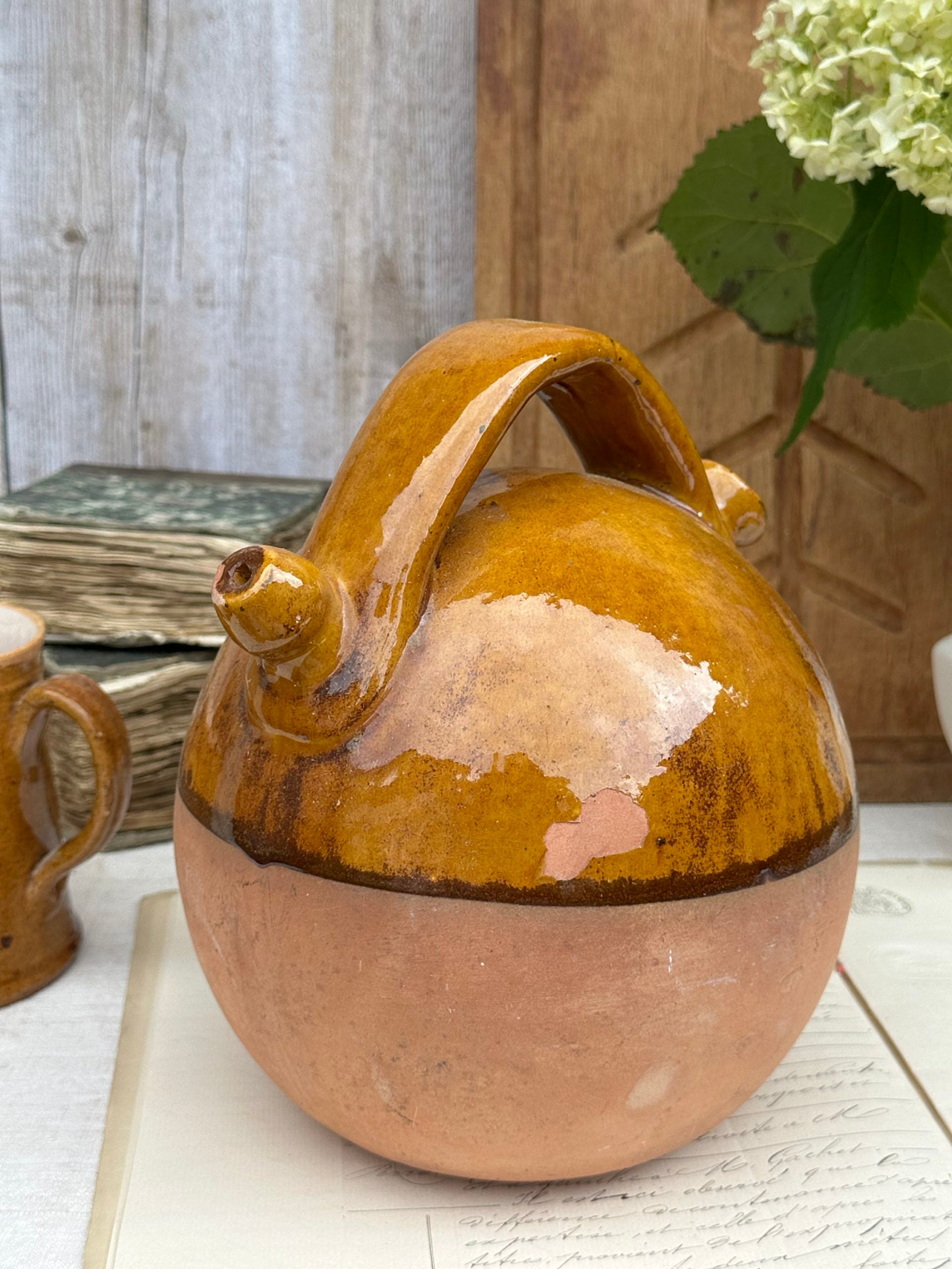 Gargoulette, a yellow glazed terracotta jug