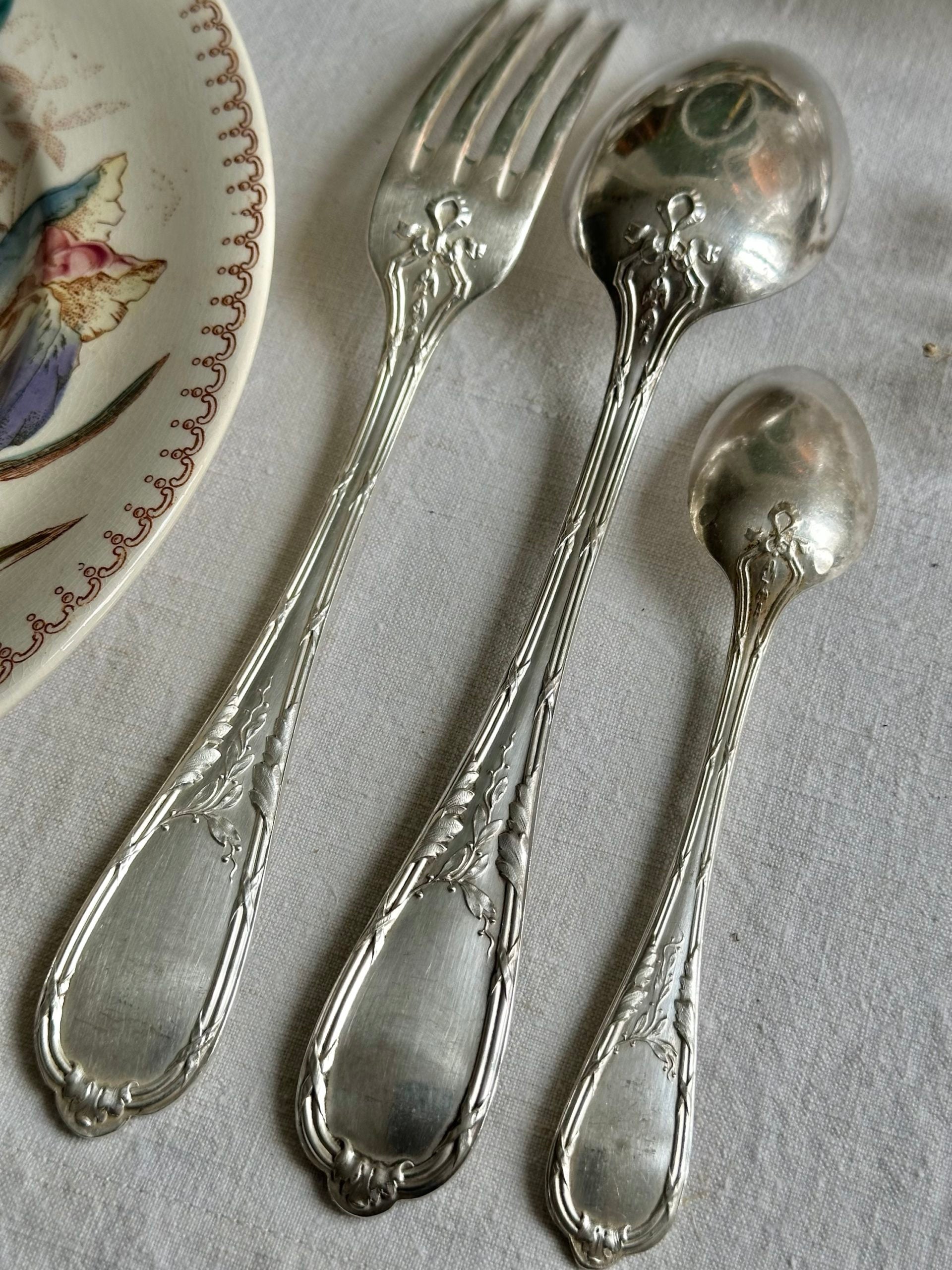 36-piece flatware set by ERCUIS silversmiths