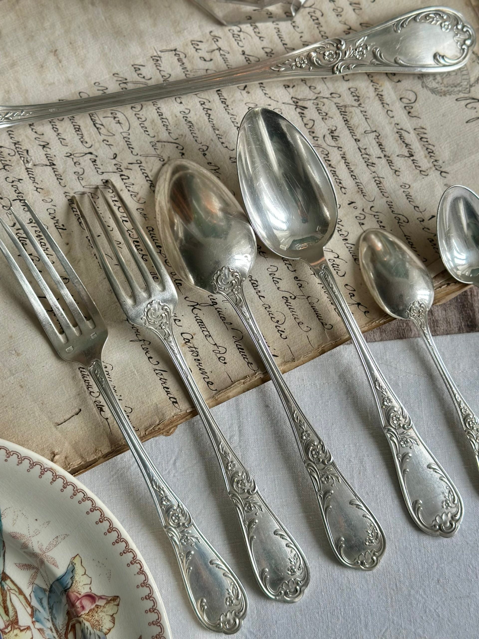 Exquisite 37-piece silver-plated flatware set from the 19th century