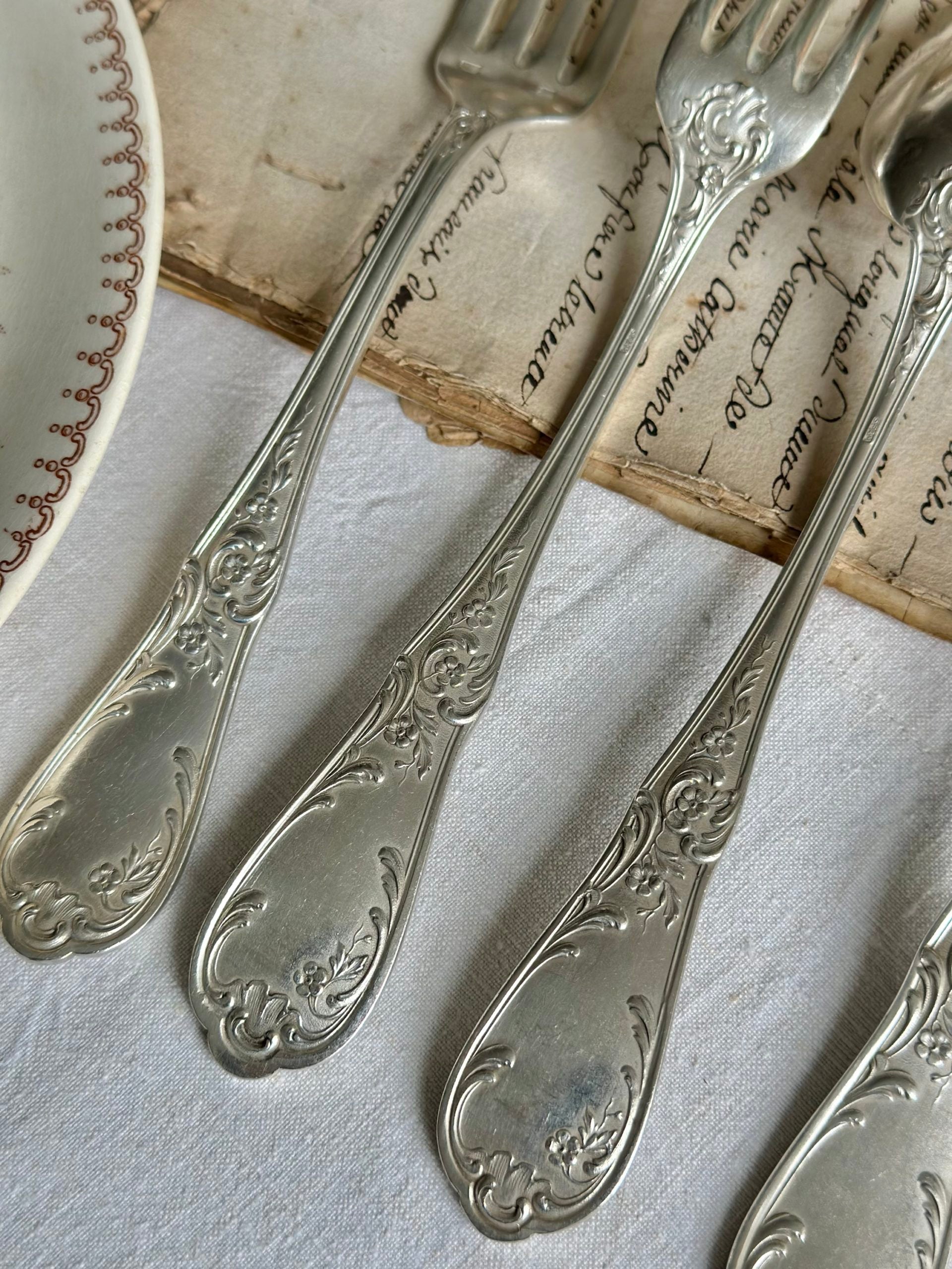 Exquisite 37-piece silver-plated flatware set from the 19th century