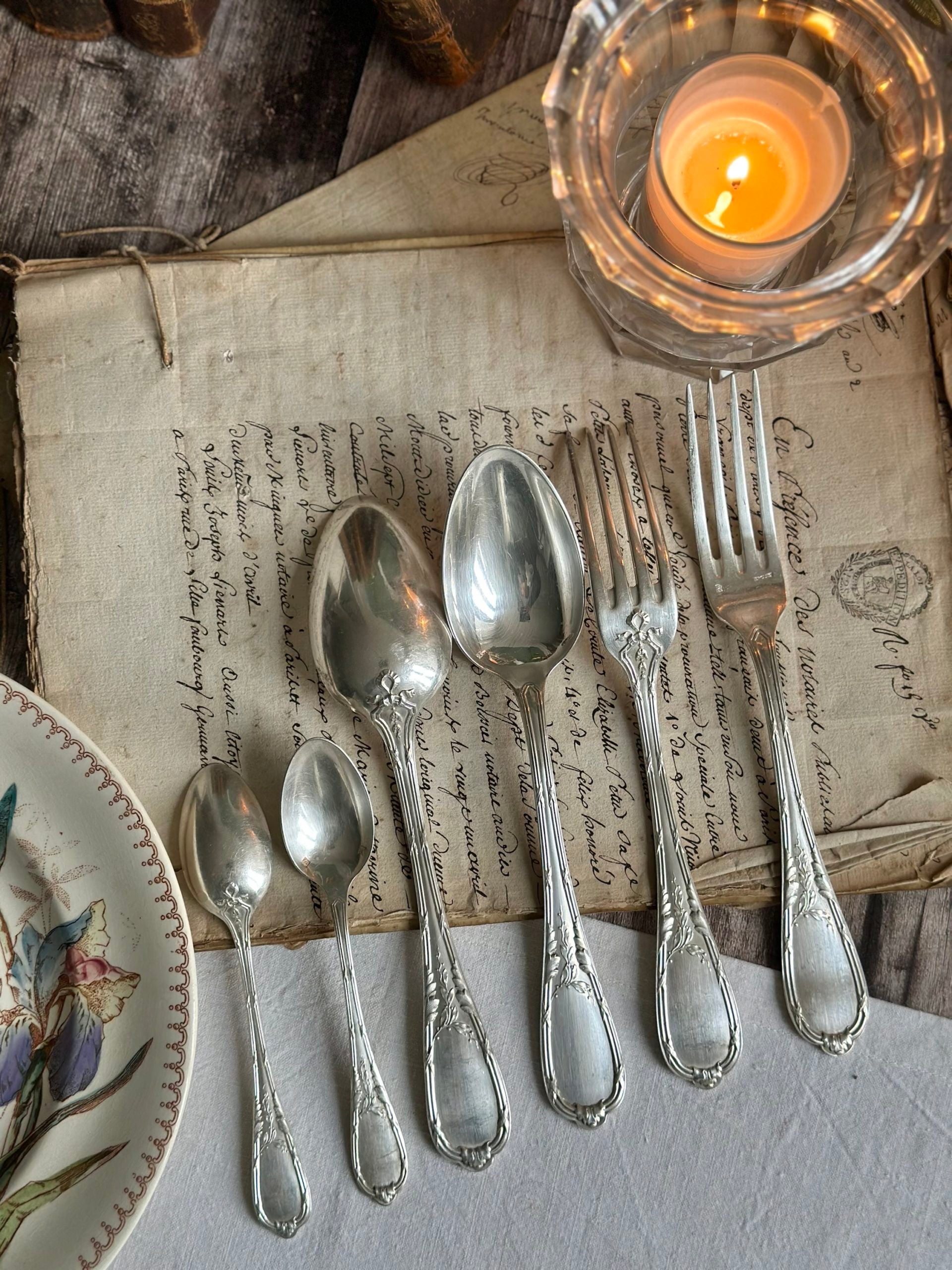36-piece flatware set by ERCUIS silversmiths