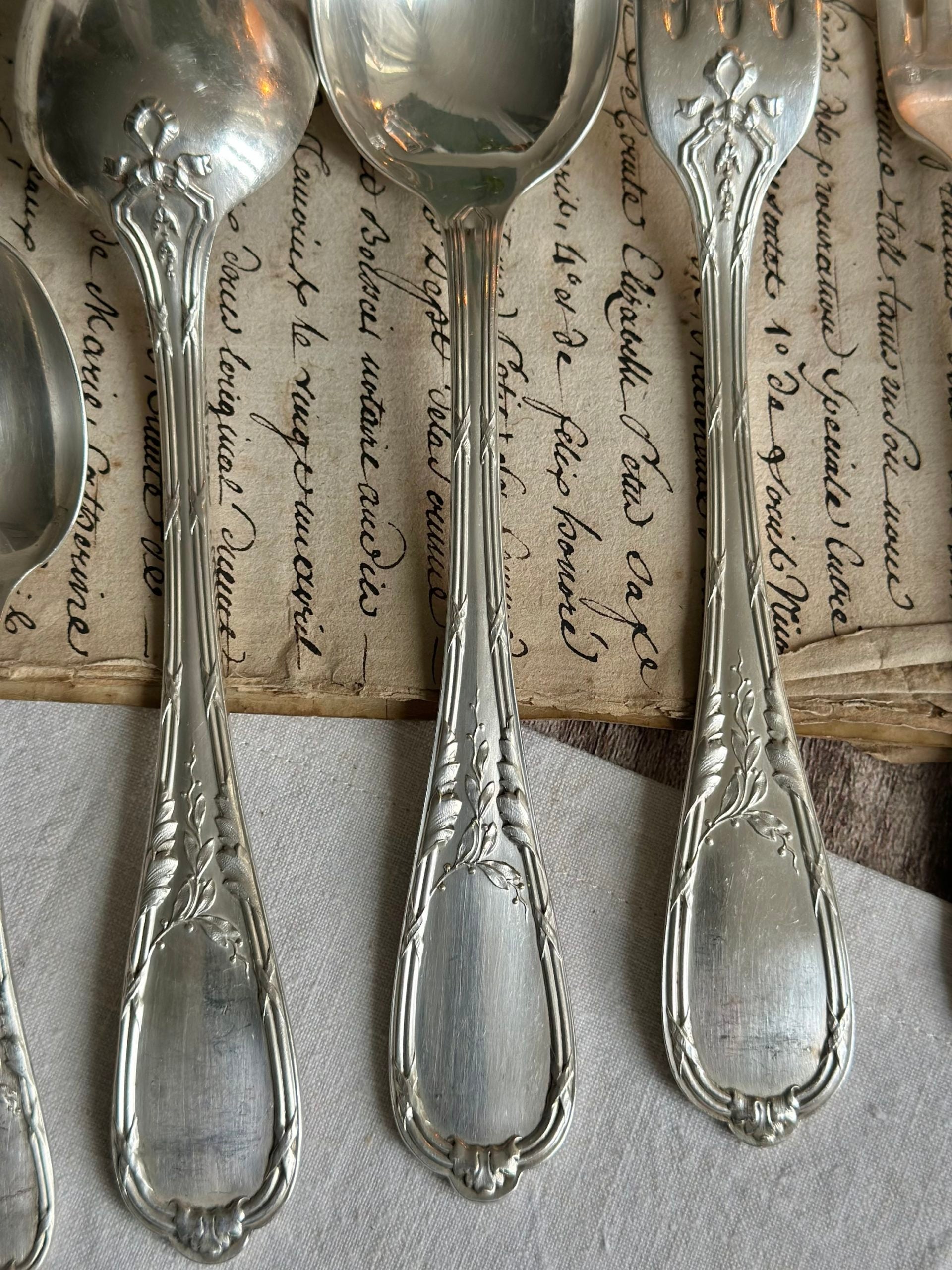 36-piece flatware set by ERCUIS silversmiths