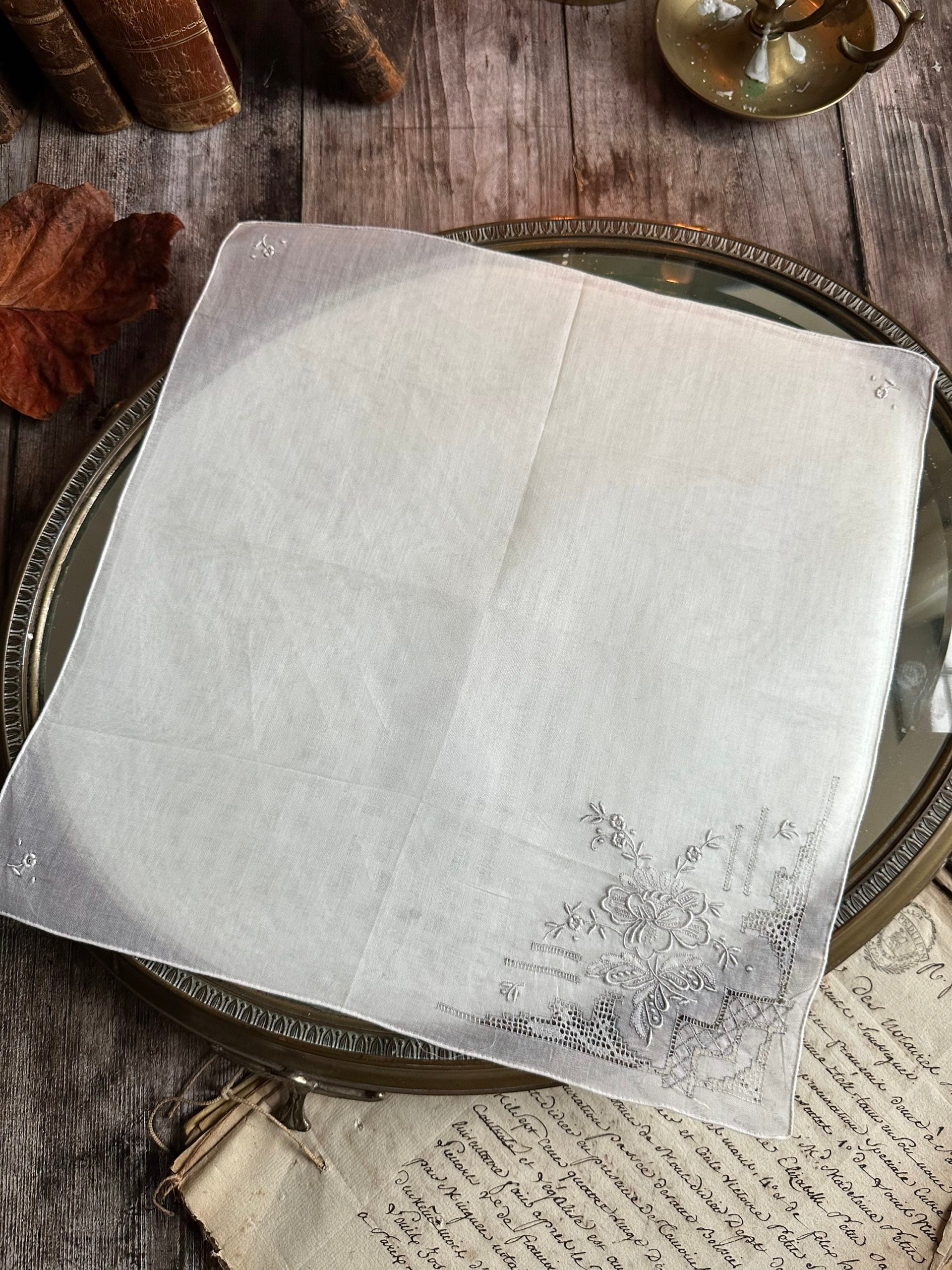 VI. Antique hand-embroidered handkerchief