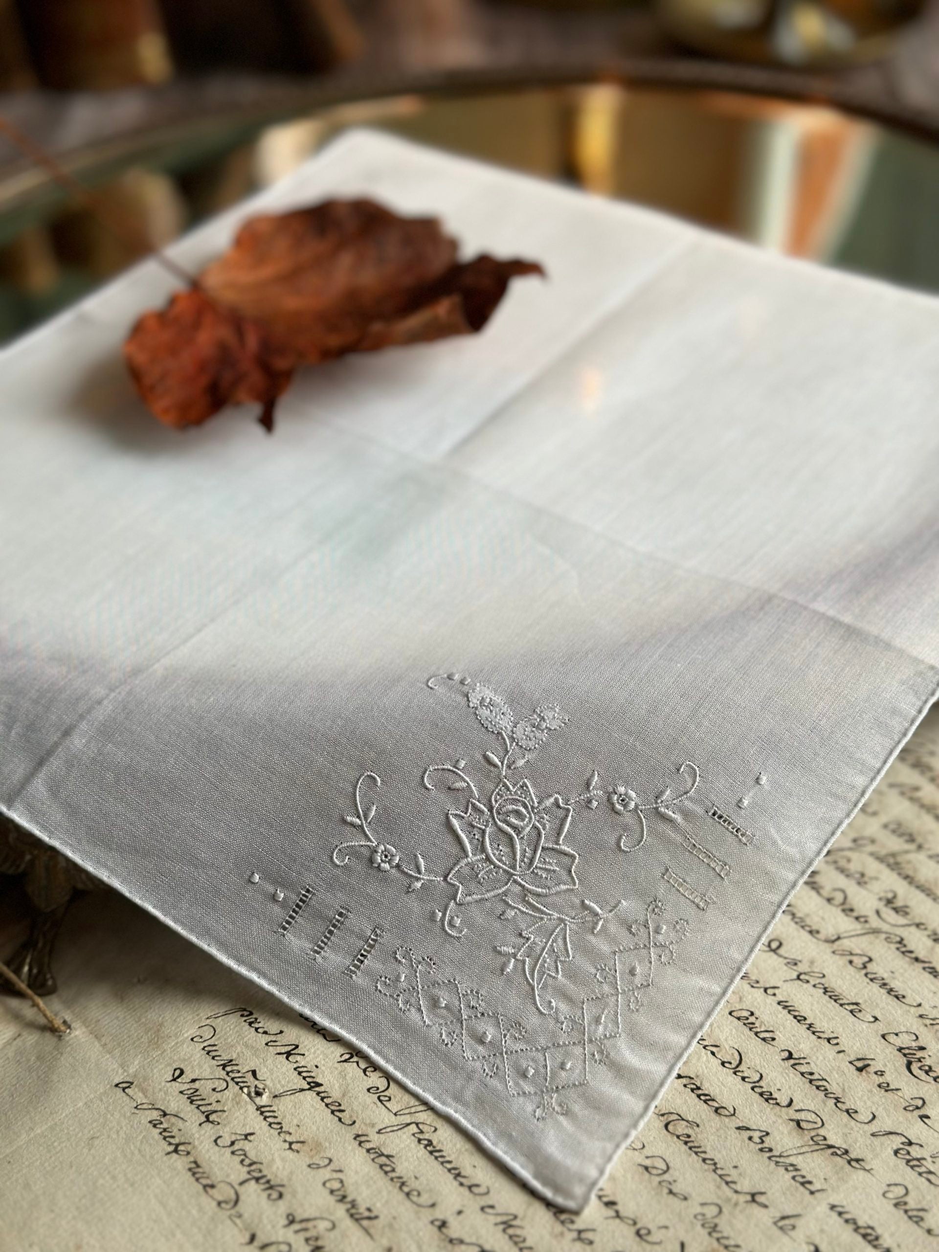 VII. Antique hand-embroidered handkerchief