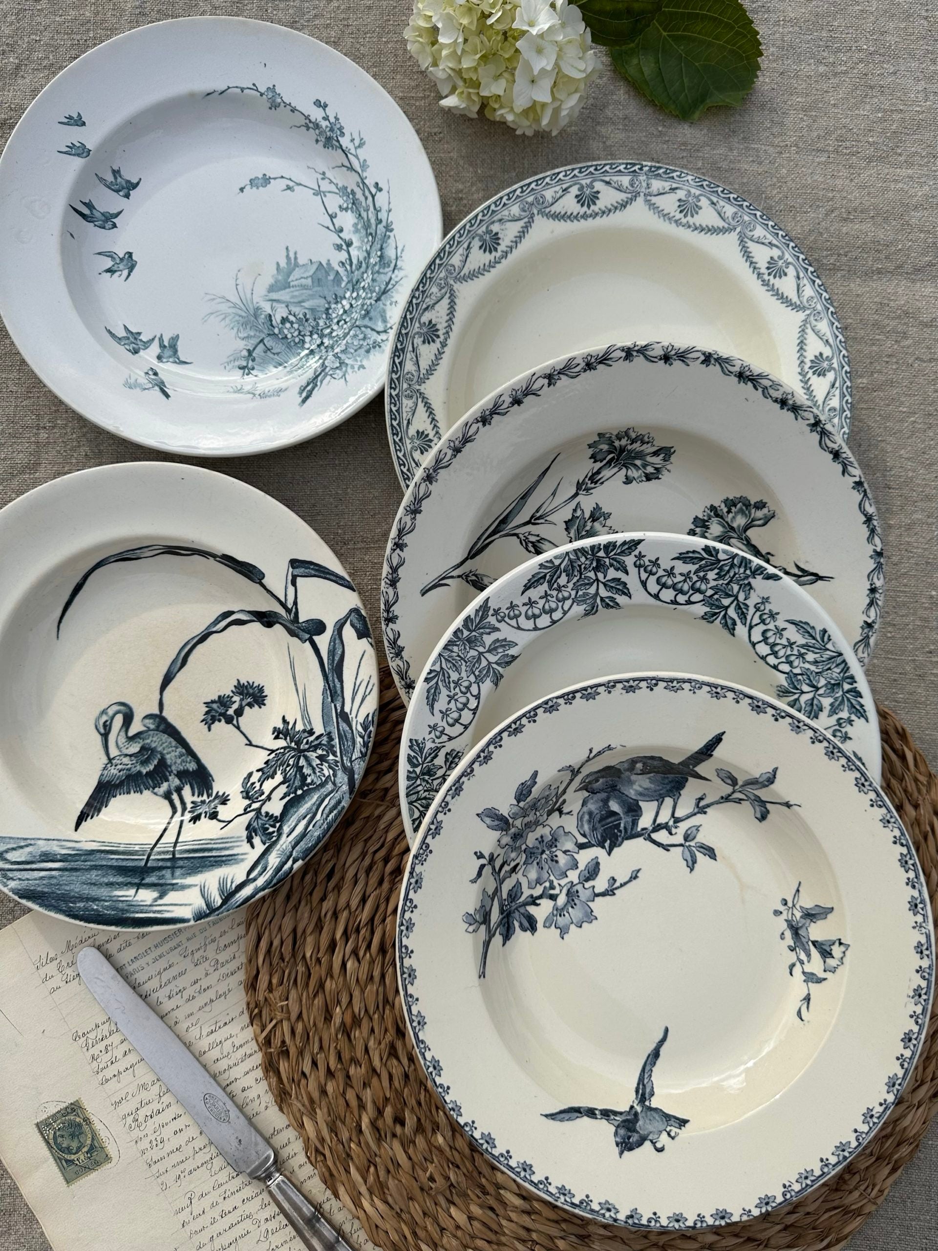 II. Set of 6 mismatched soup plates