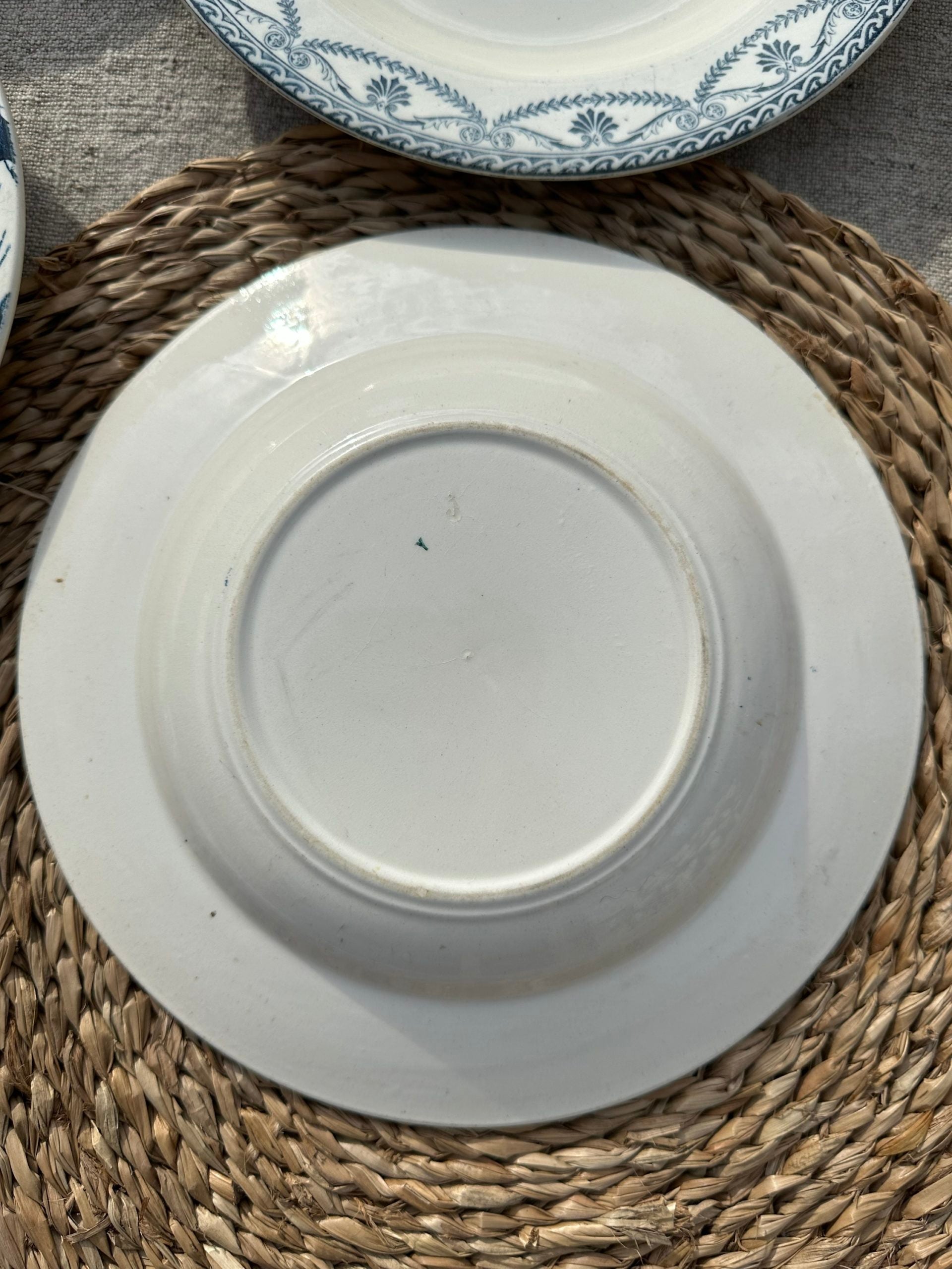 II. Set of 6 mismatched soup plates