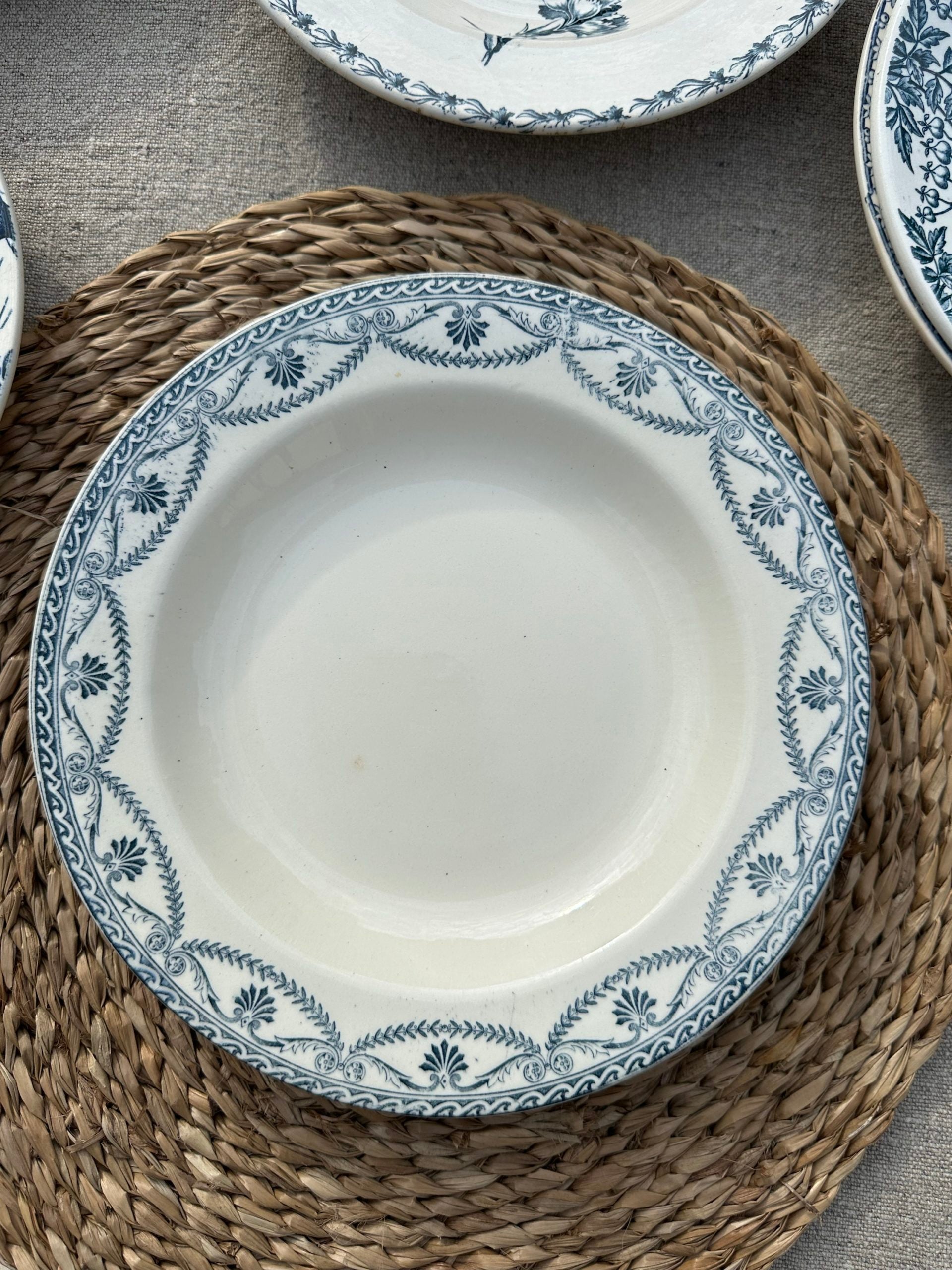 II. Set of 6 mismatched soup plates