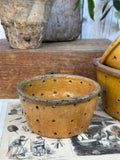 pot of yellow faisselle