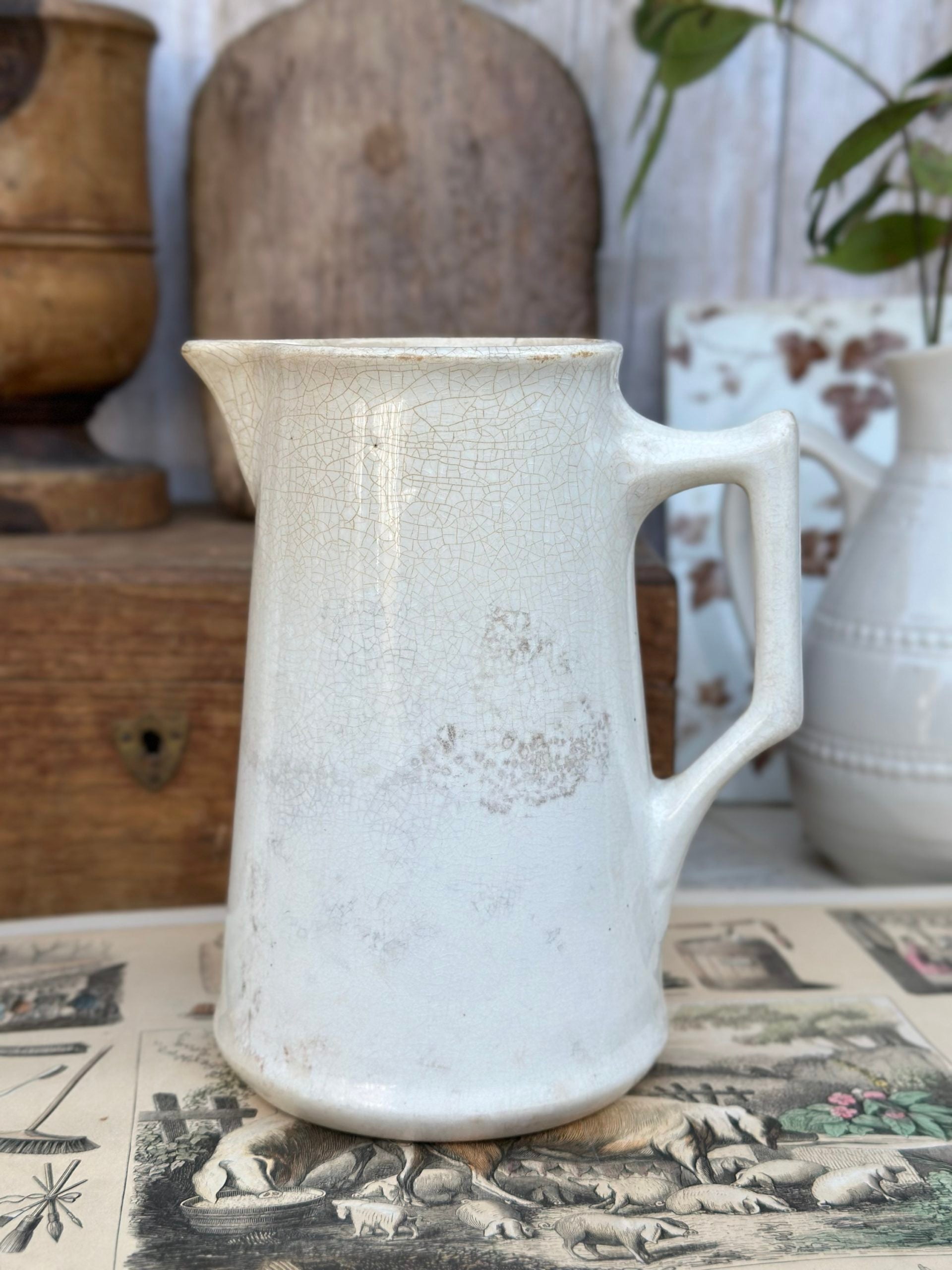 Patinated pitcher from Creil and Montereau