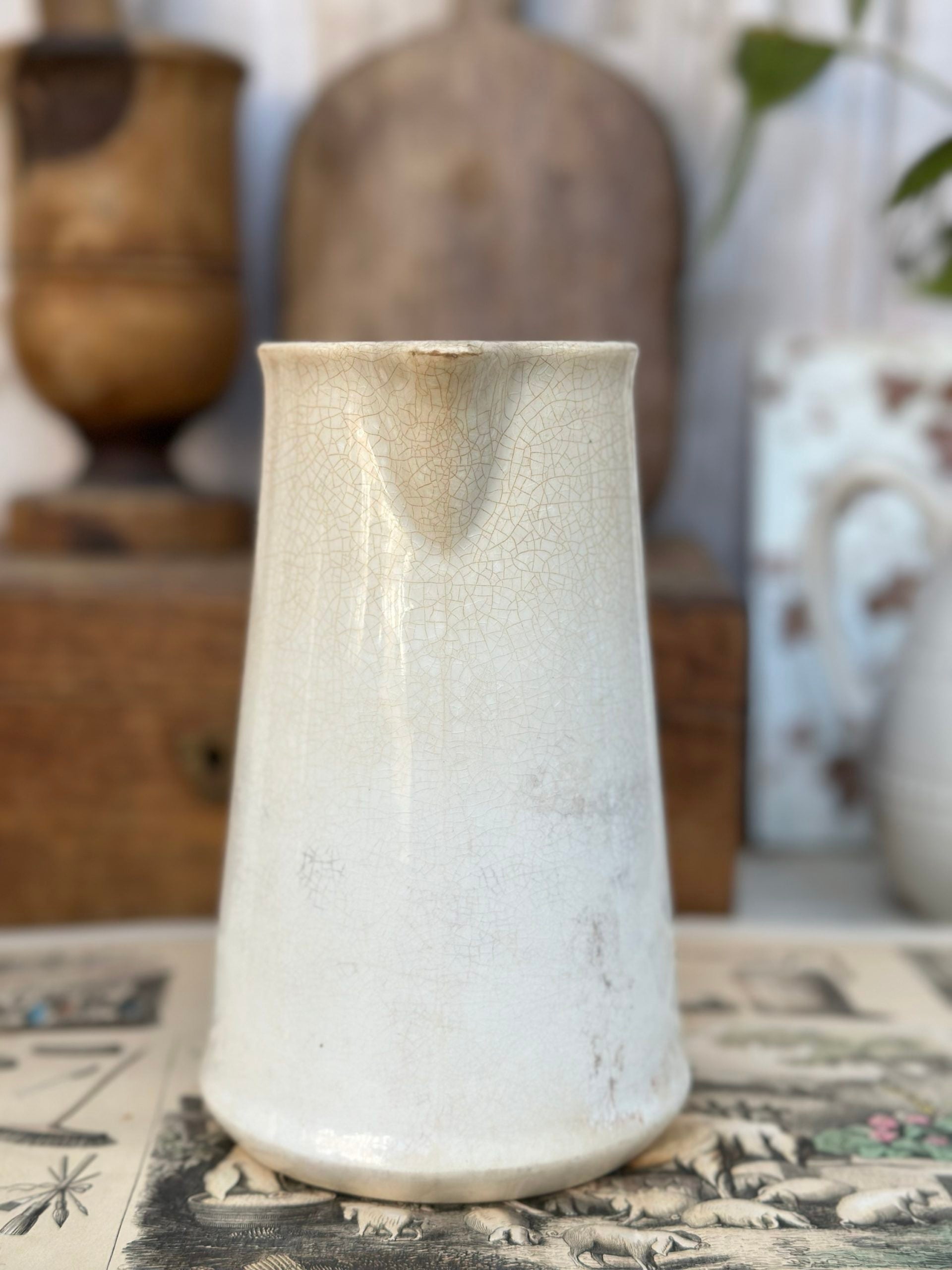 Patinated pitcher from Creil and Montereau