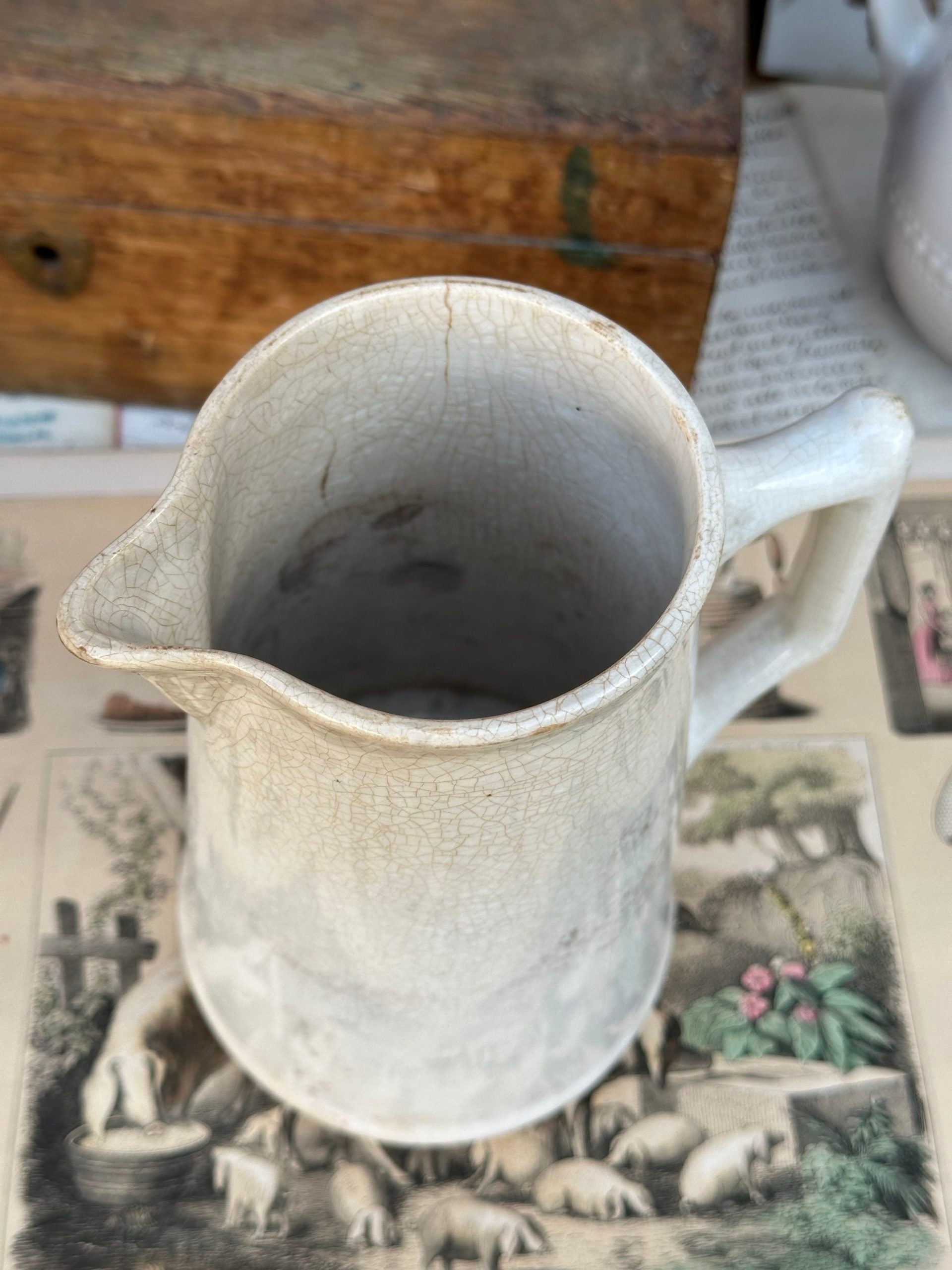 Patinated pitcher from Creil and Montereau
