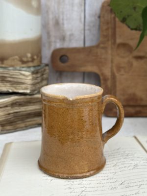 Petit pichet ancien en terre cuite vernissé jaune